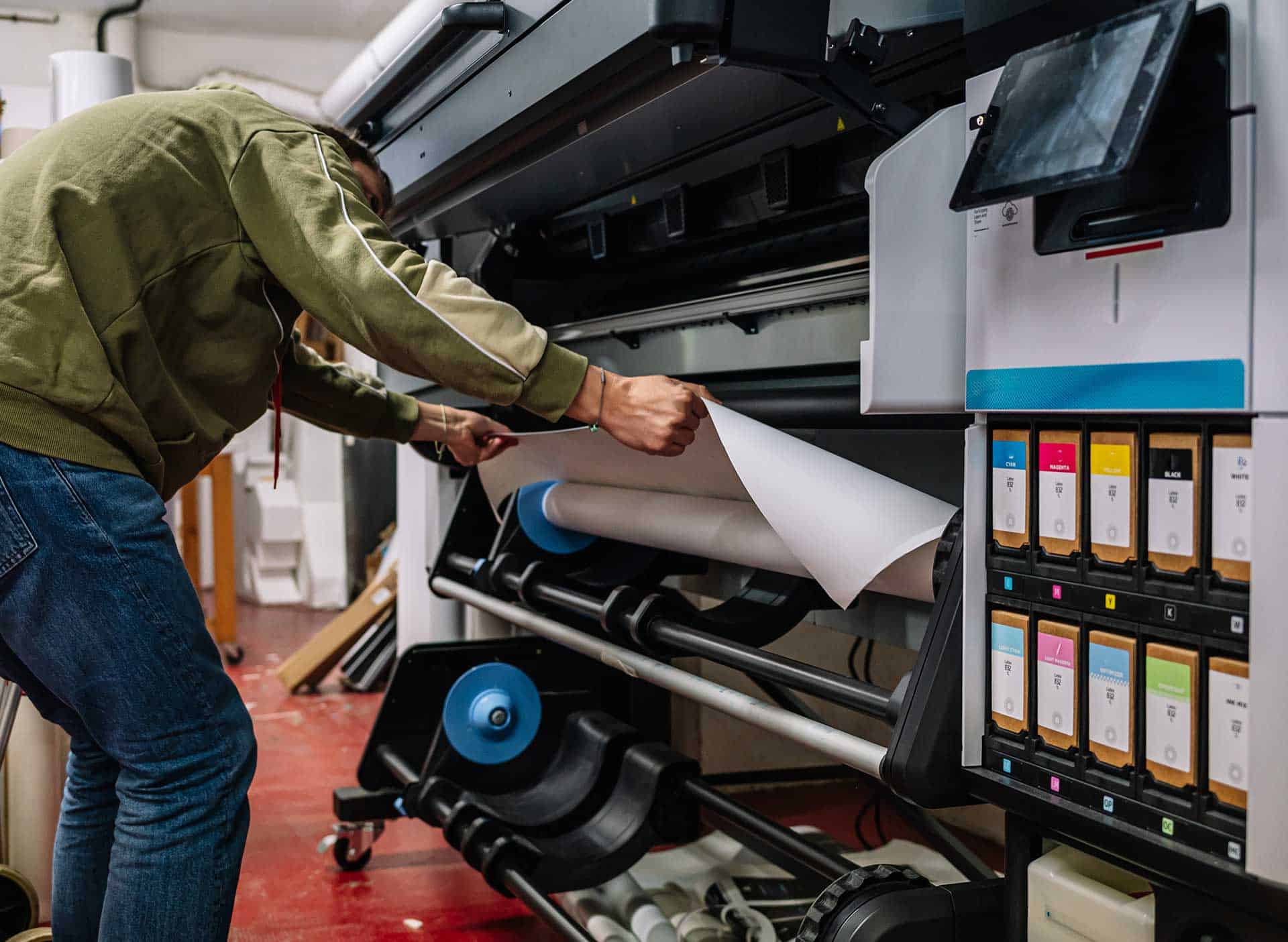 Professional large-format printing on wide-format printer at C2S Printing Shop.