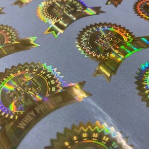 We create 2D anti-counterfeit hologram stickers for supplement packaging, enhancing brand credibility and providing 100% protection against counterfeit products.