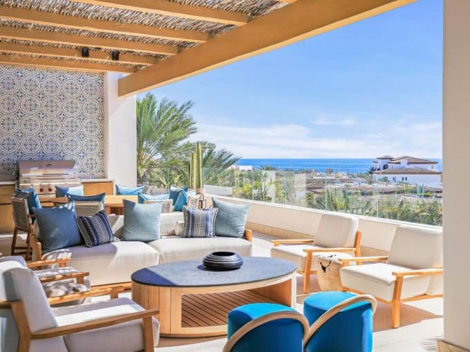 Covered Terrace With Lounge Seating And An Ocean View In Cabo Del Sol