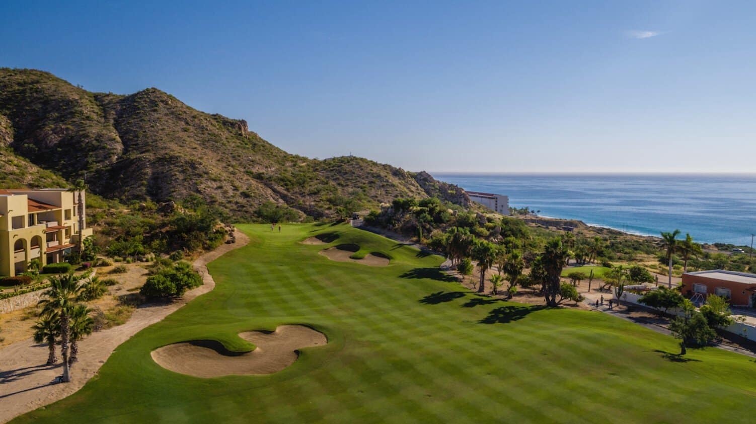 Modern Condo In Cabo Real With Ocean Views, Resort-Style Pool, And Palm-Lined Surroundings