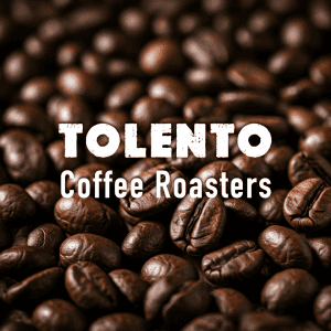 Close-up of roasted coffee beans at Café Tolento, specialty grade small-batch coffee.