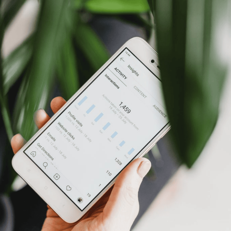 A smartphpone with the Instagram analytics page open