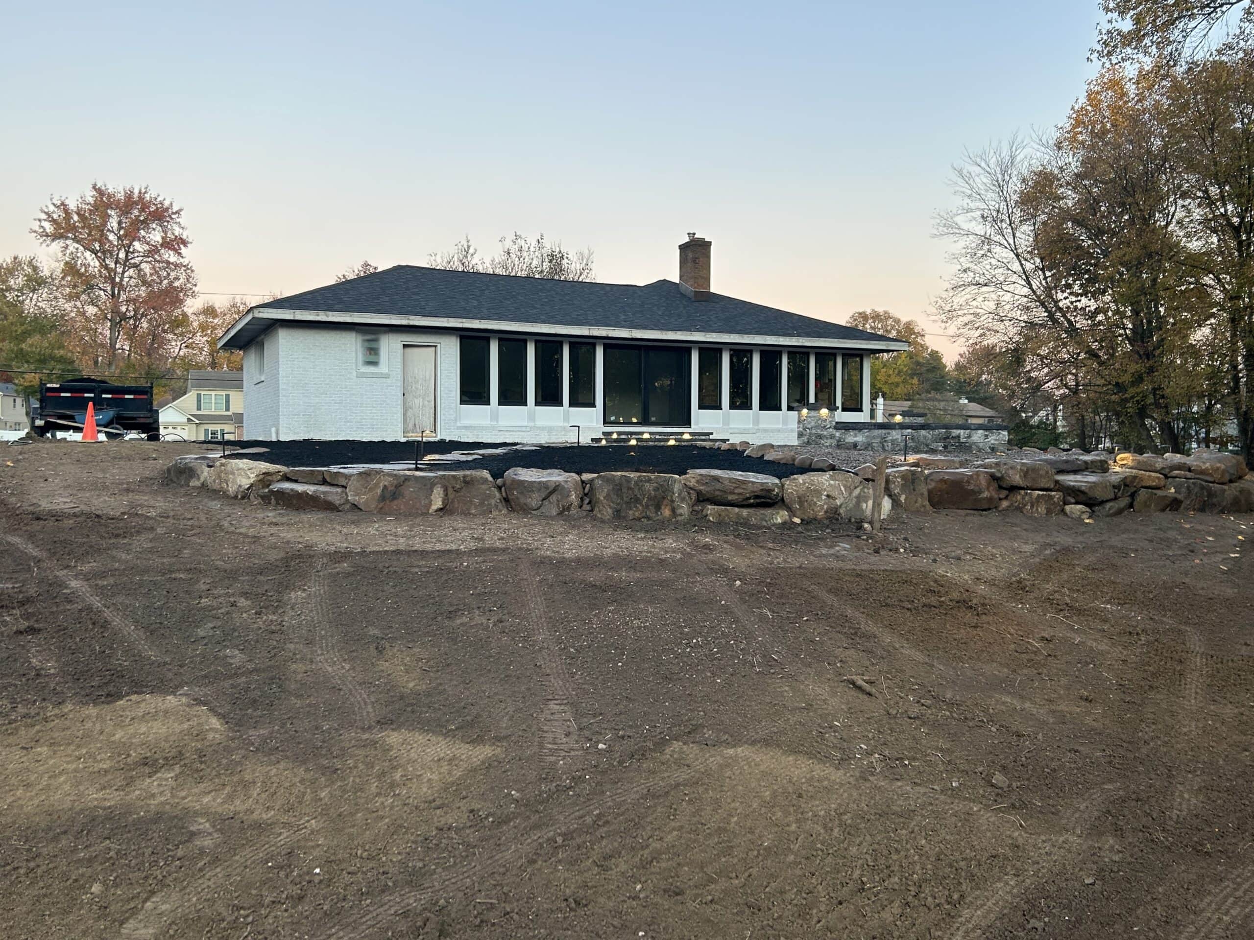Professional landscaping and yard grading services for new home construction.