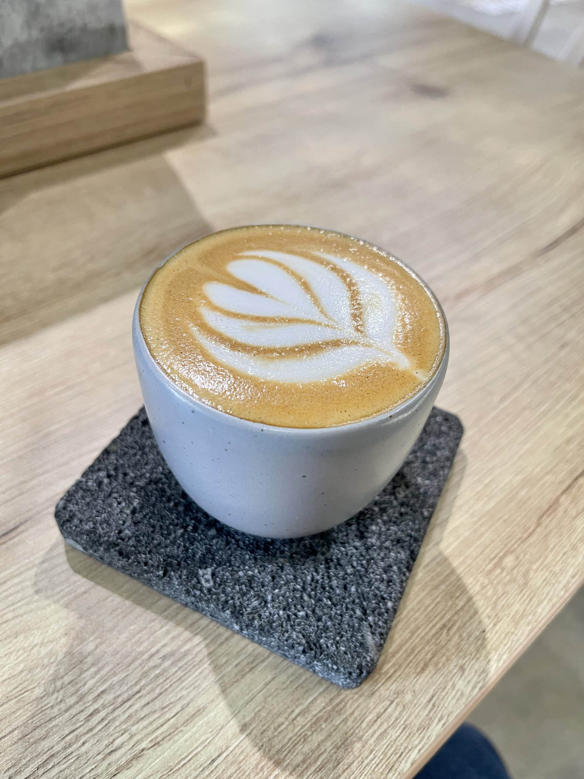 Latte art in a ceramic cup at SISU Coffee Studio, Casco Viejo Panama