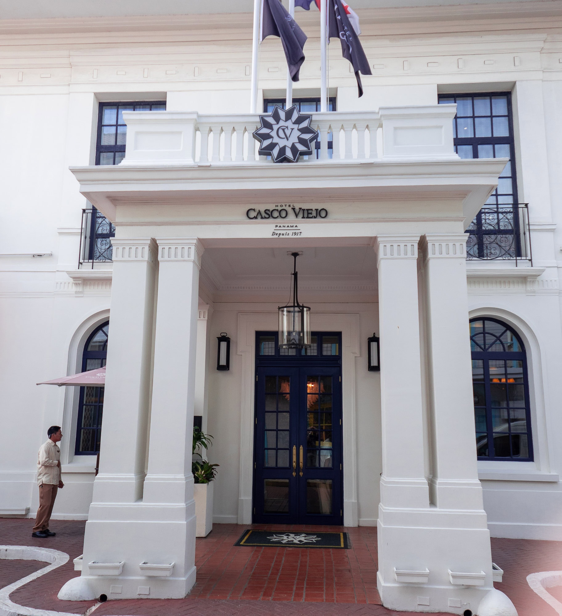 Elegant front entrance of Sofitel Legend Casco Viejo, a luxury heritage hotel in Panama City, featuring neoclass