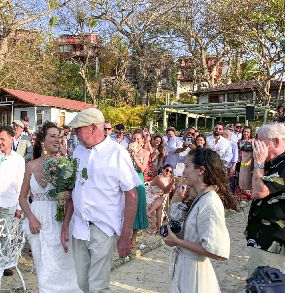 Father walking daughter down the aisle at a destination wedding in Contadora Island, Panama