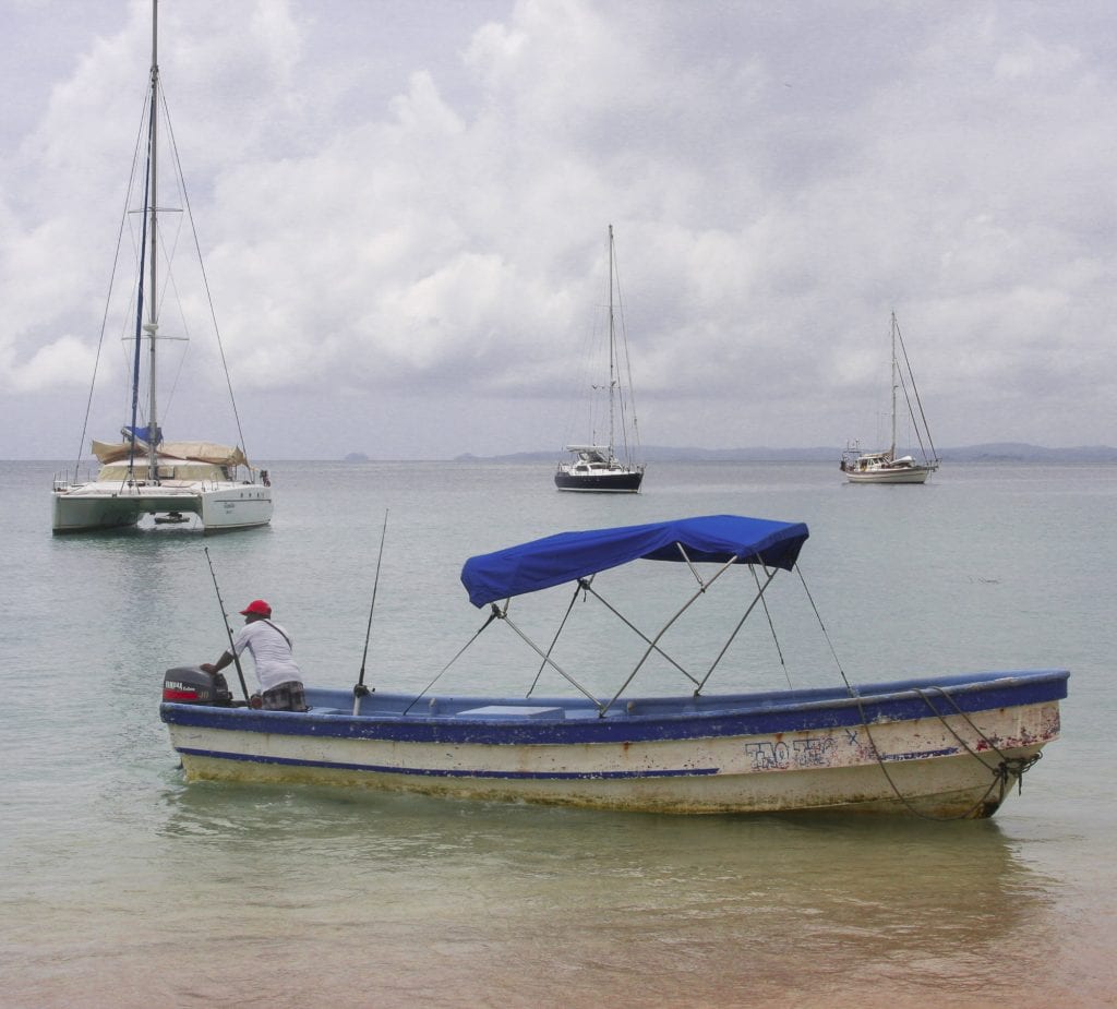Local fishing boat anchored near the shore of Contadora Island, Panama.