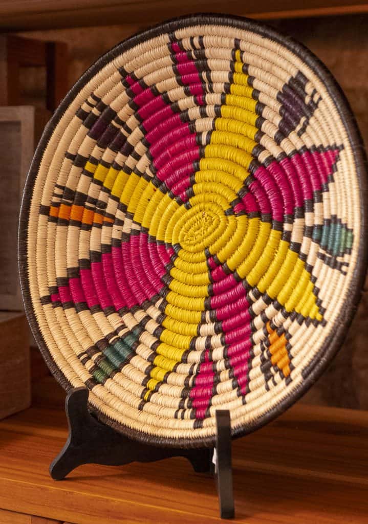 Colorful woven artisan basket on display at El Motete gift shop in Casco Viejo
