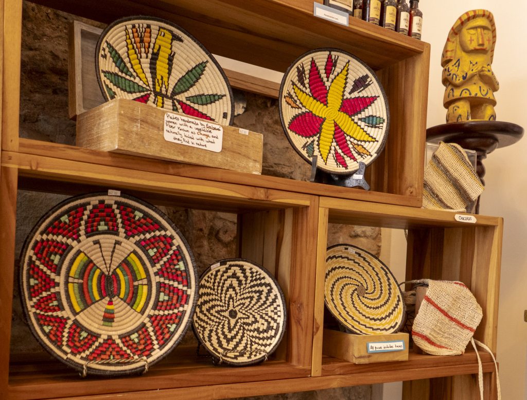 Handwoven baskets and indigenous crafts on display at El Motete gift shop in Casco Viejo