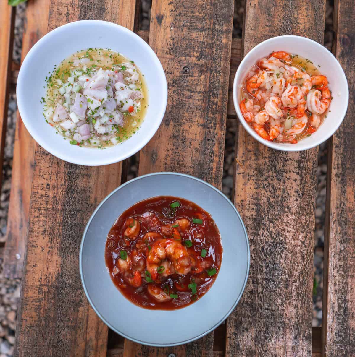 Three freshly made ceviches by Chef Christian at Captain Bahía, featuring classical Panamanian flavors prepared daily.