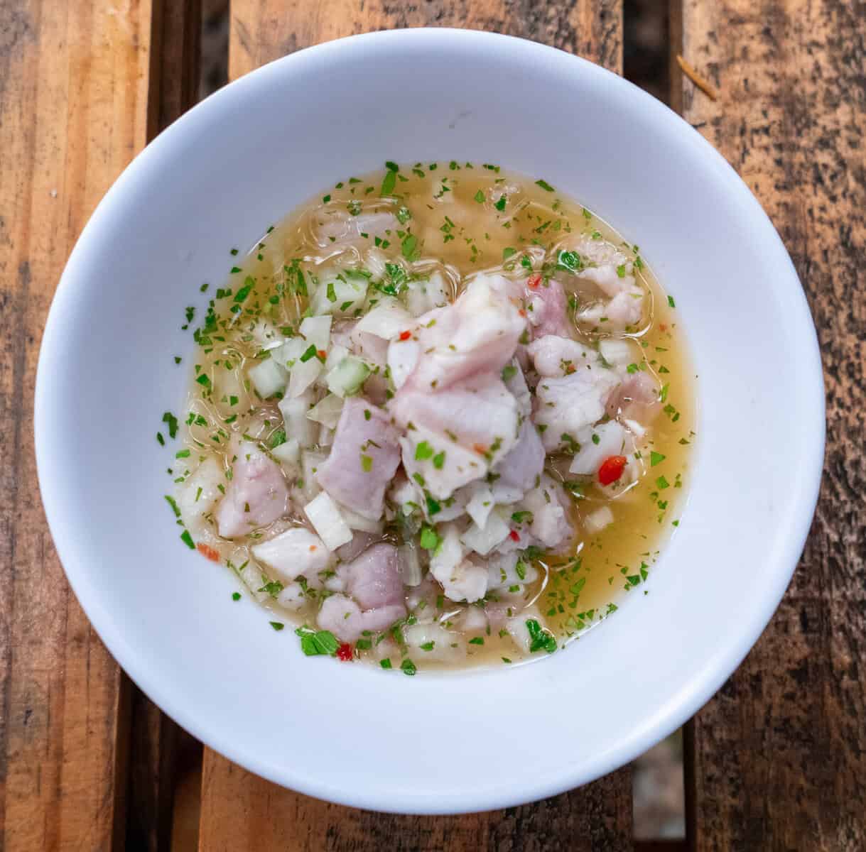 Classical Panamanian fish ceviche served at Captain Bahía, made with fresh white fish, lime, onions, and herbs.