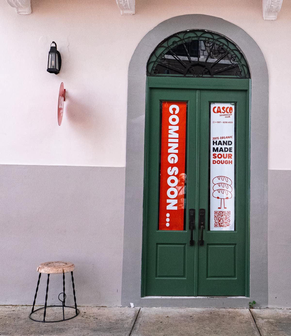 The Casco Sourdough Club bakery entrance in Casco Viejo with handmade sourdough signage.