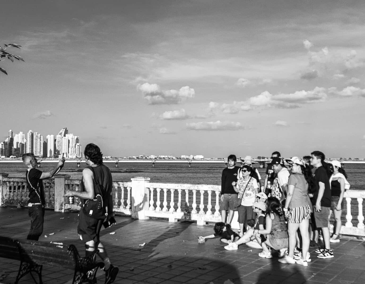Tour group gathered at waterfront viewpoint in Casco Viejo Panama