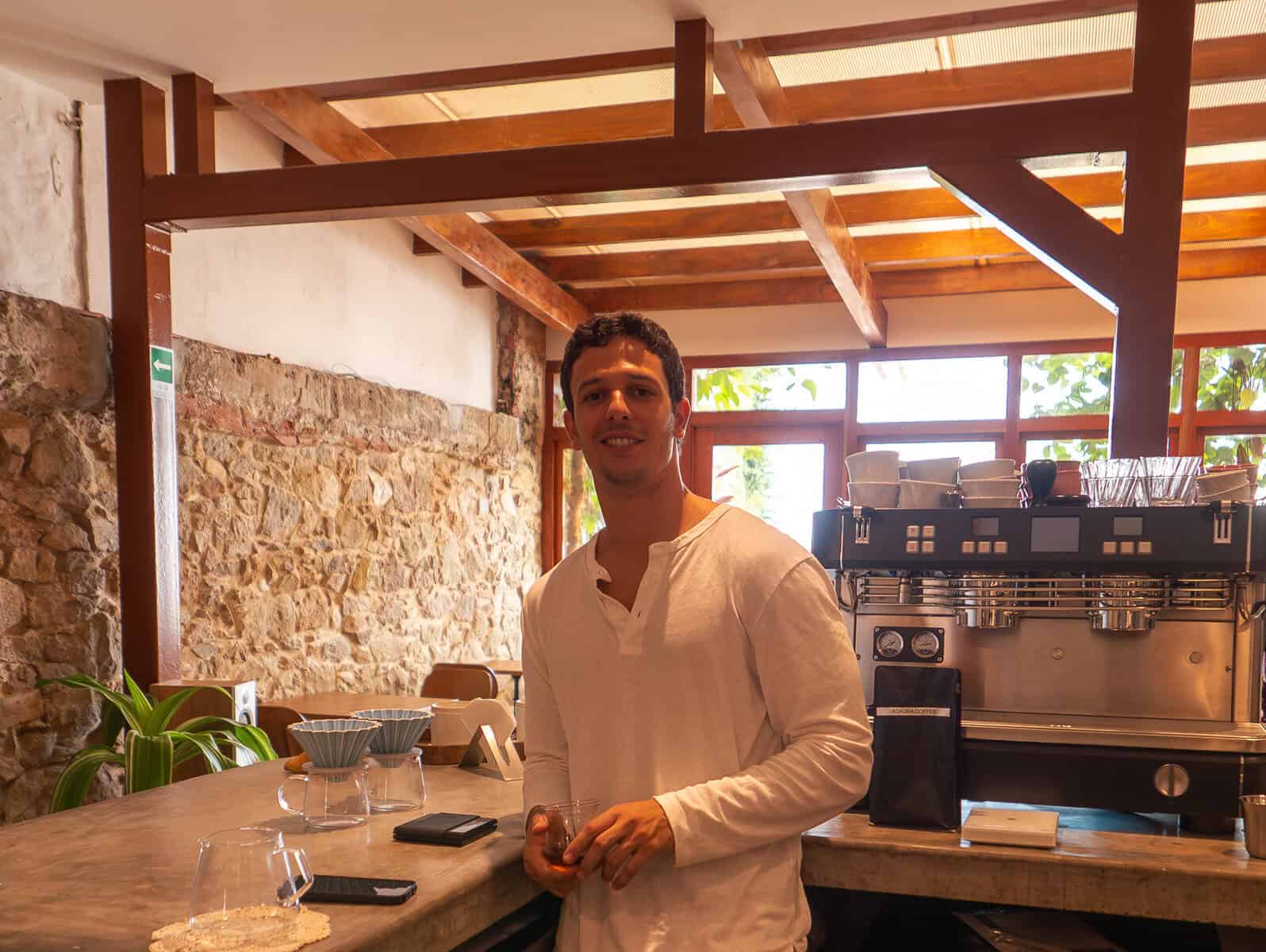 Paulo at Olympia Coffee Studio Casco Viejo Panama behind the coffee bar