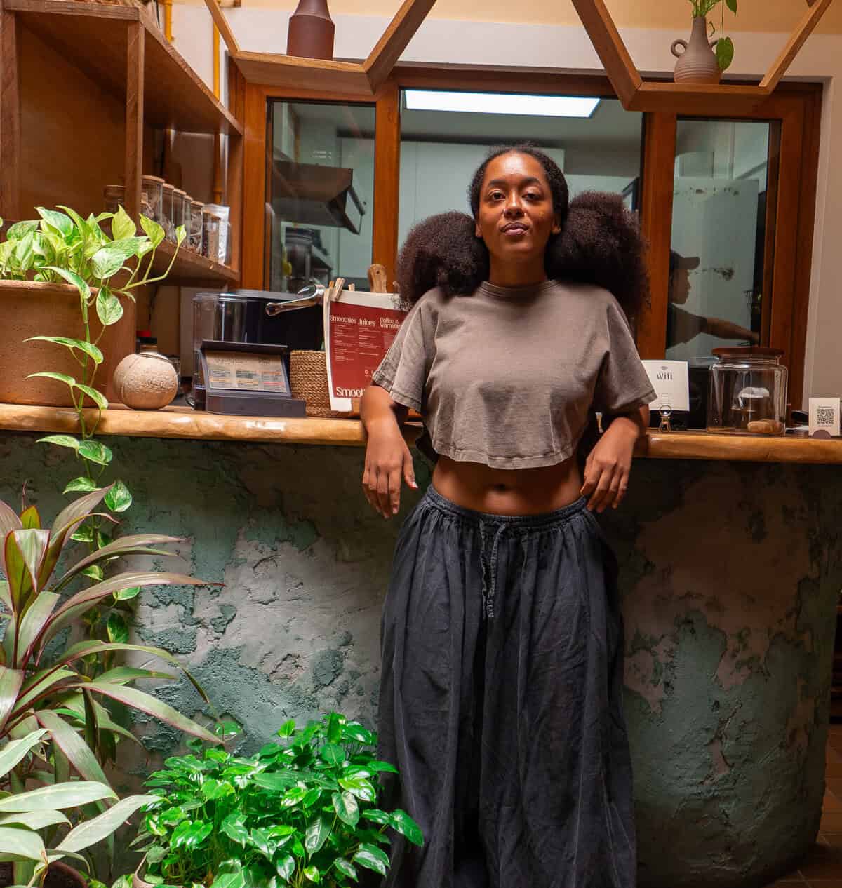 Mia Grenald Sharfi, owner-operator of Vegan Shack, standing inside her plant-based restaurant in Casco Viejo, Panama.