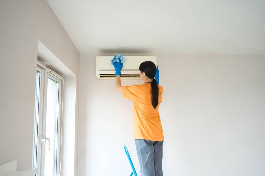 Clean and well-maintained air conditioner running efficiently after regular filter cleaning and care.