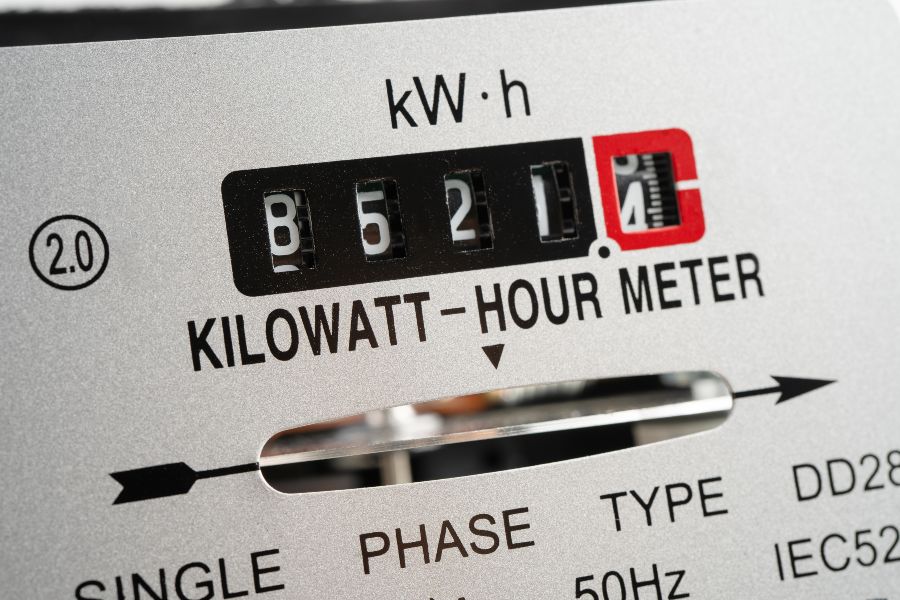 Generalized view of single-phase kilowatt-hour meter showing power consumption relevant to AC costs.