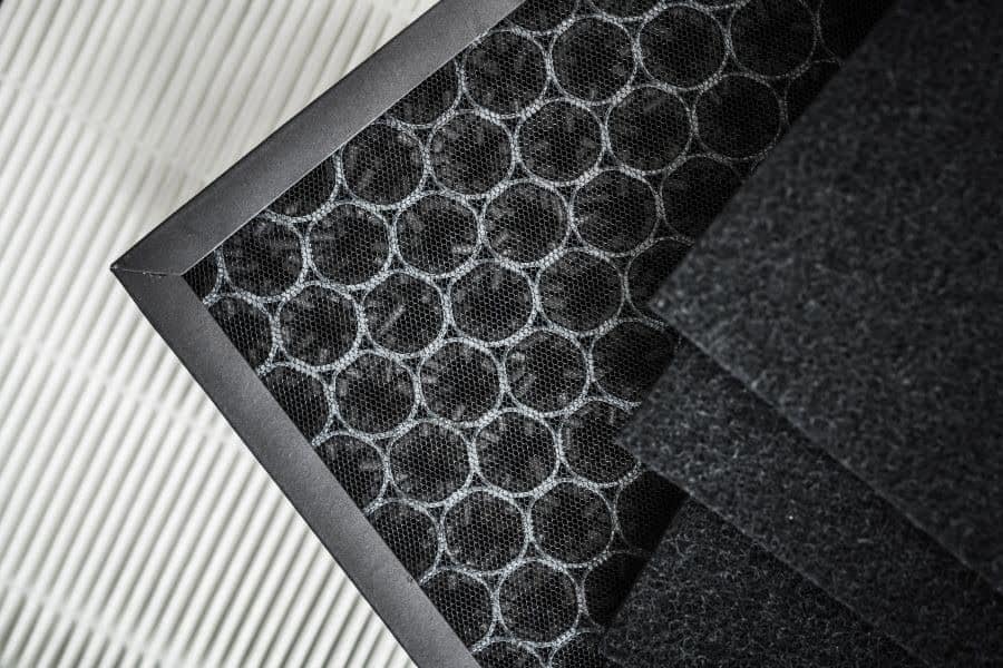 Close-up of layered HEPA air filter on a white background.