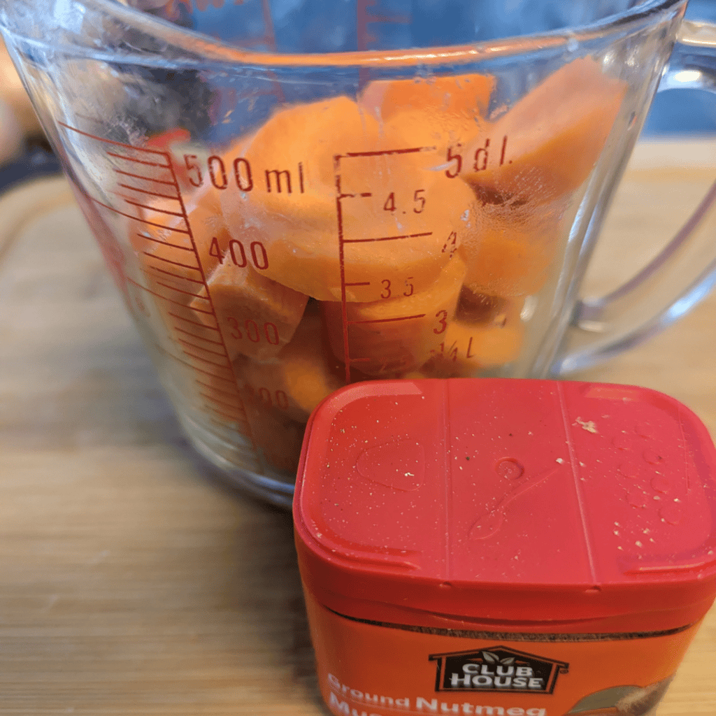 cup up carrot in measuring cup