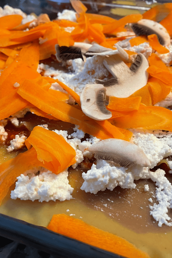 making a vegetarian lasagna shaved carrots