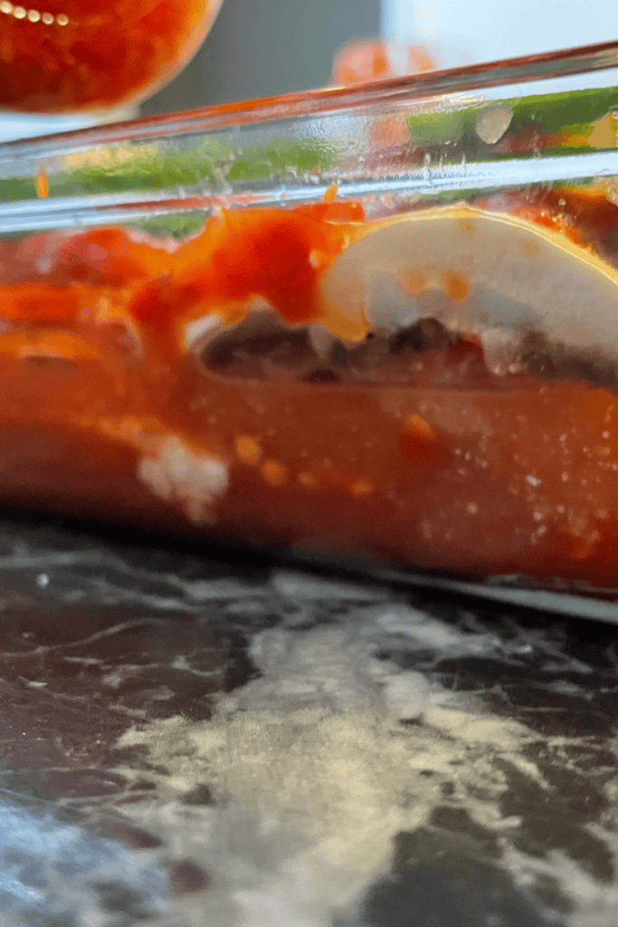 adding water to baking pan