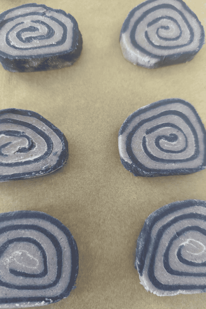 slice taro pinwheel cookie dough log evenly