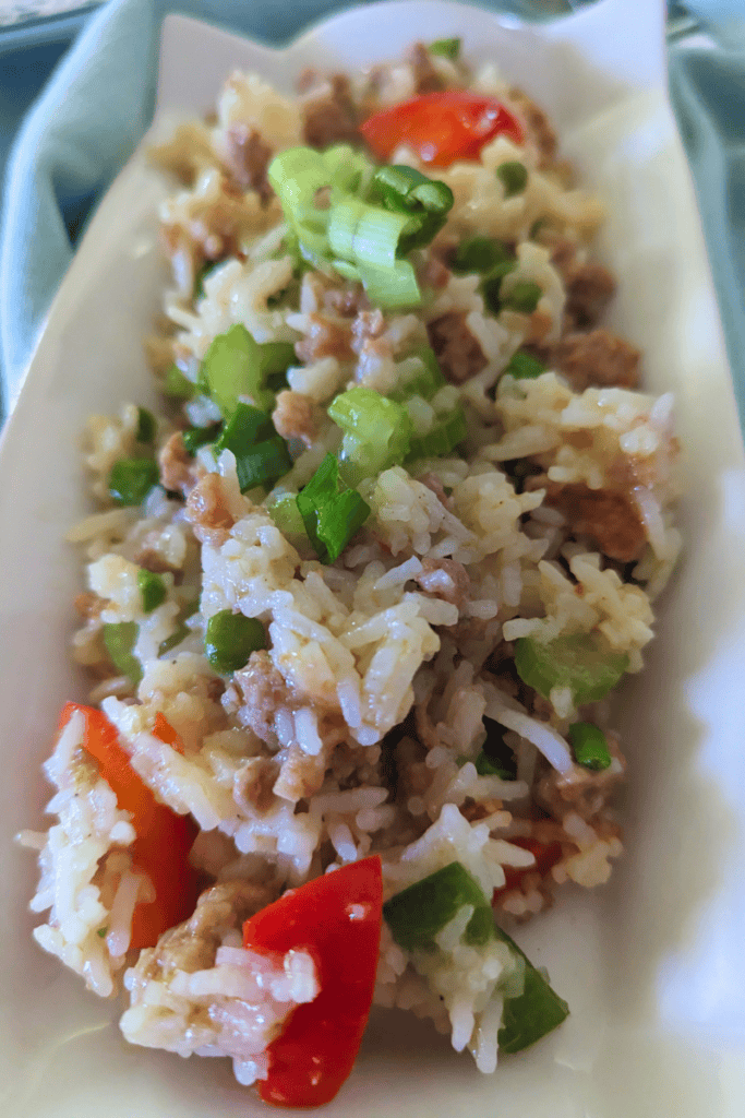top with green onion to spicy sausage fried rice dinner