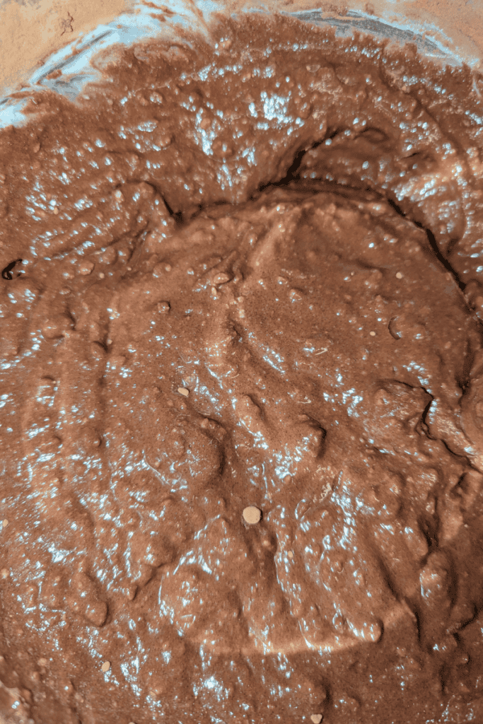 adding cocoa powder to muffin batter