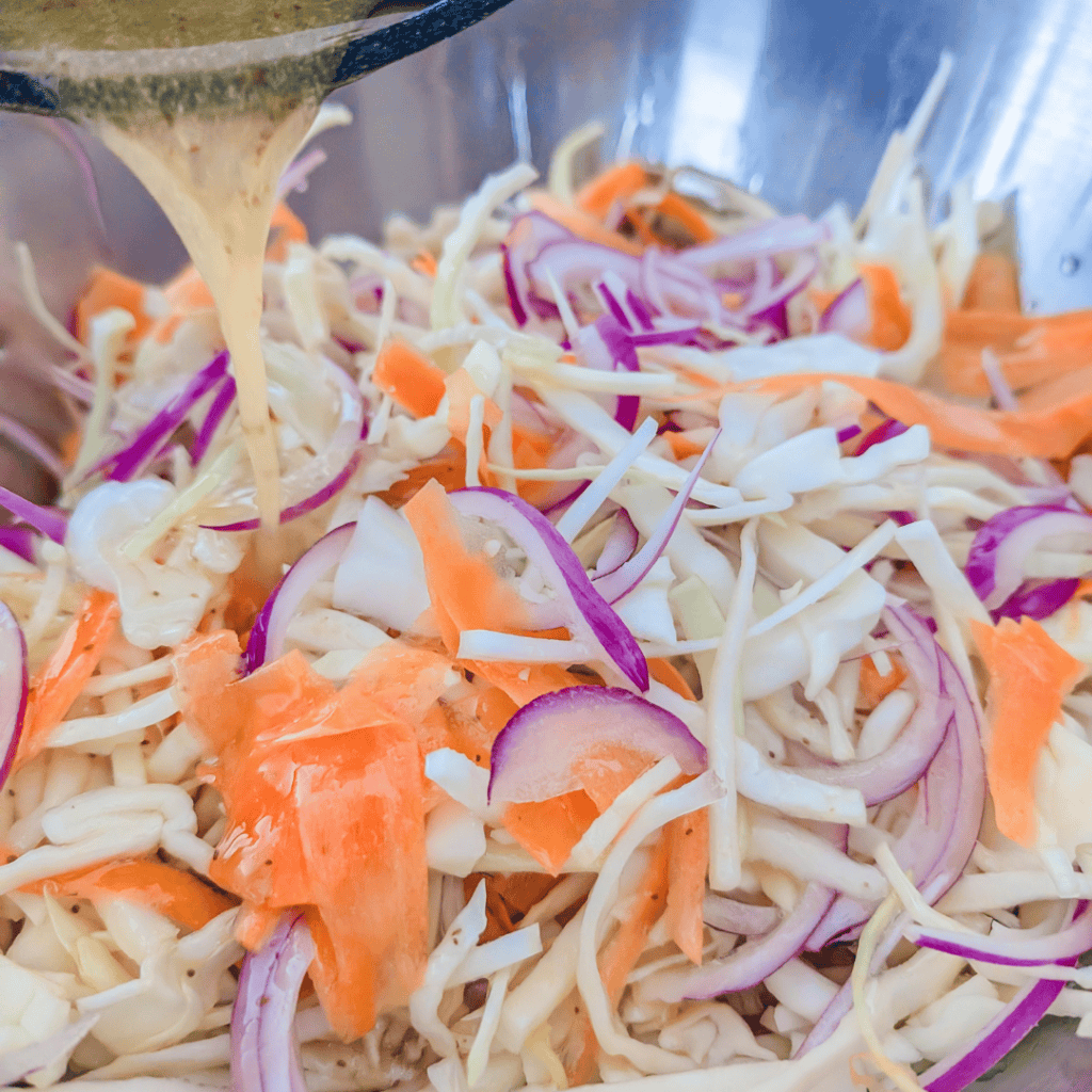 Fresh coleslaw with homemade dressing, no mayo, vibrant vegetables.