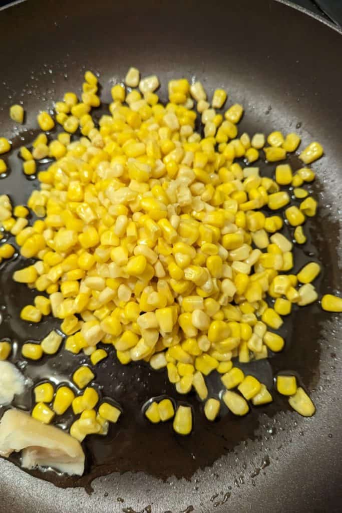 add canned corn to bacon fat