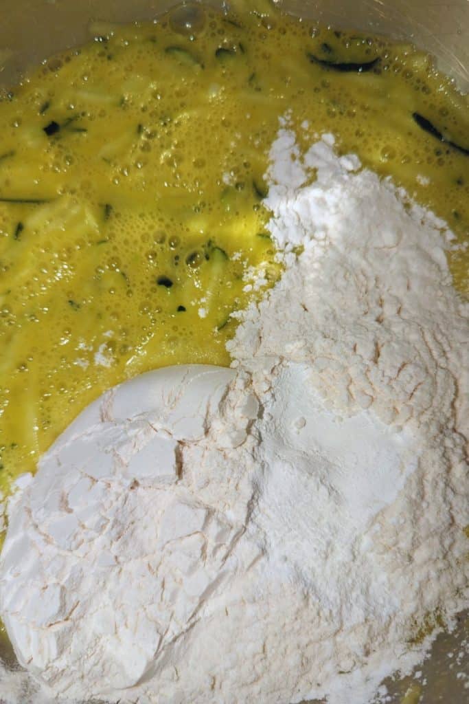 add flour baking powder to eggs zucchini