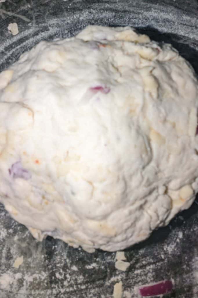 knead biscuit dough into soft ball