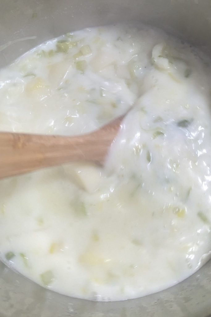 mix in milk to chunky potato leek soup