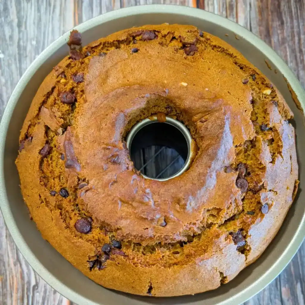 the top of the baked pumpkin chocolate chip bundt cake