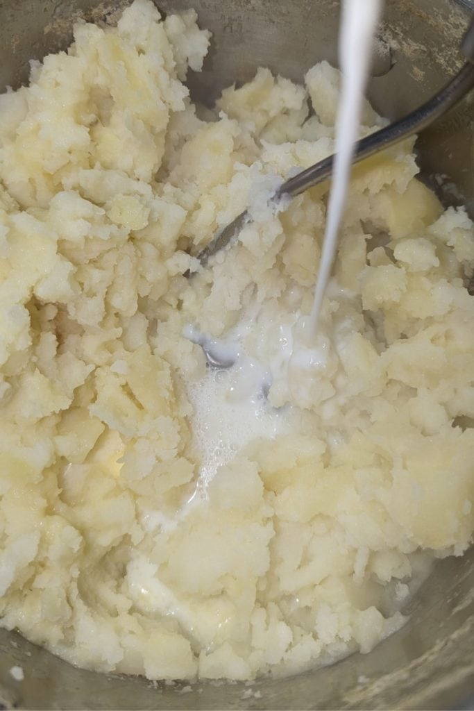 add milk to the potato and parsnip mash