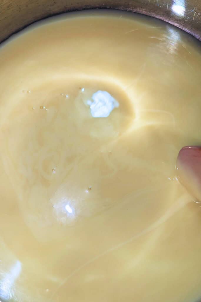 add sweetened condensed milk to saucepan