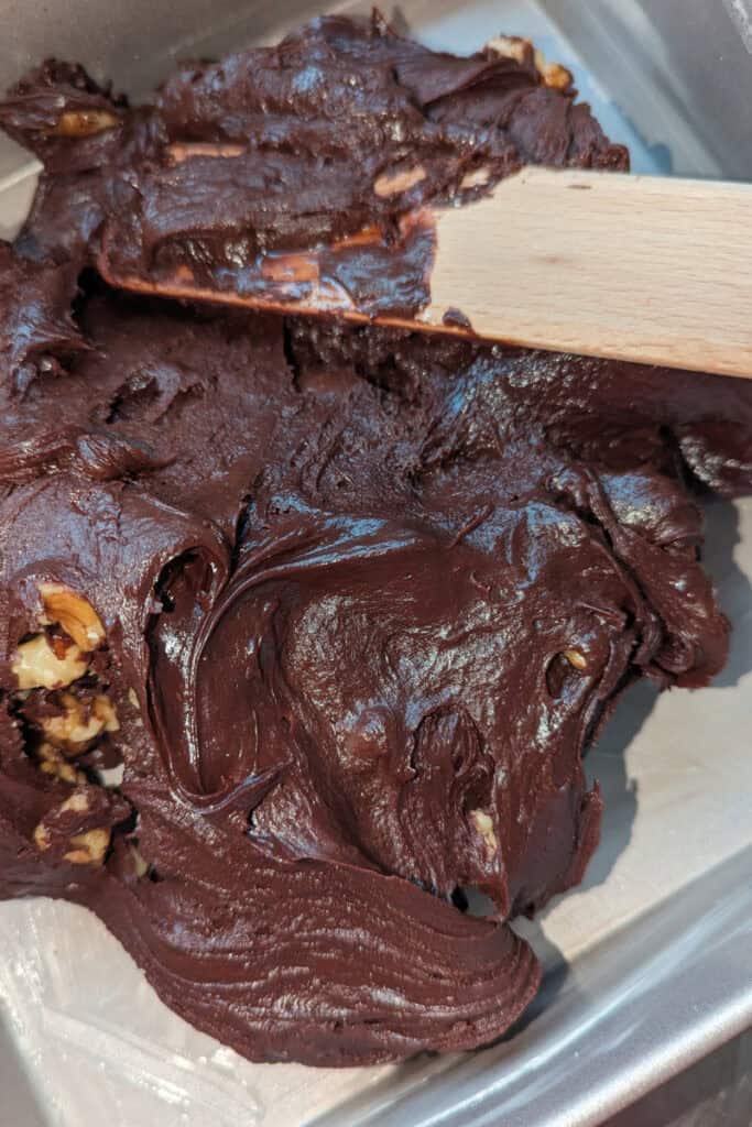 add walnuts and put fudge mixture into prepared baking pan