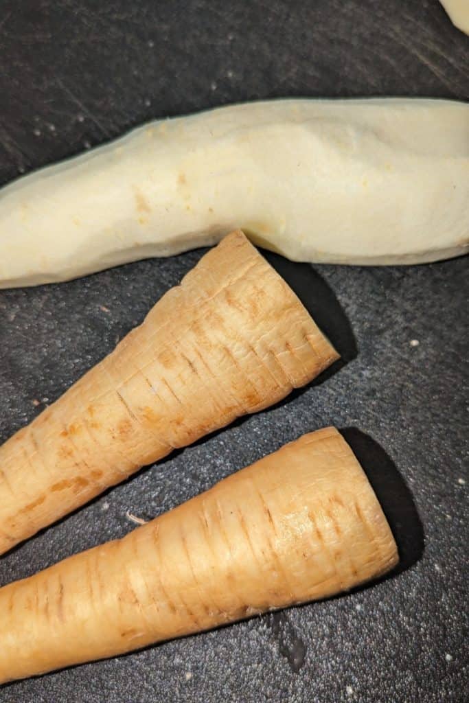peeled parsnip with unpeeled
