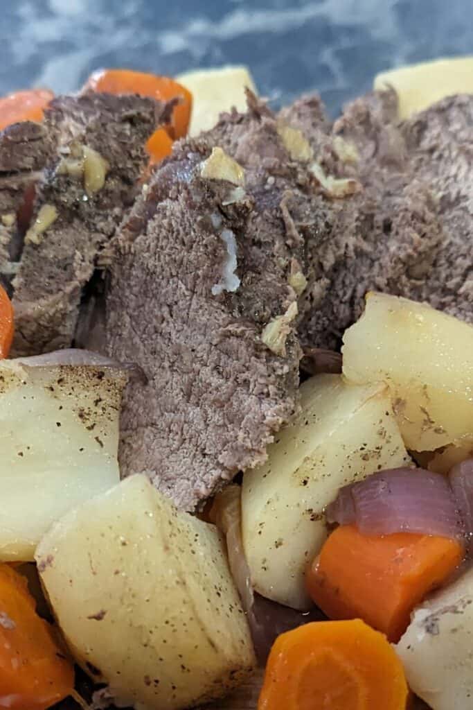 cooked roast beef and vegetables