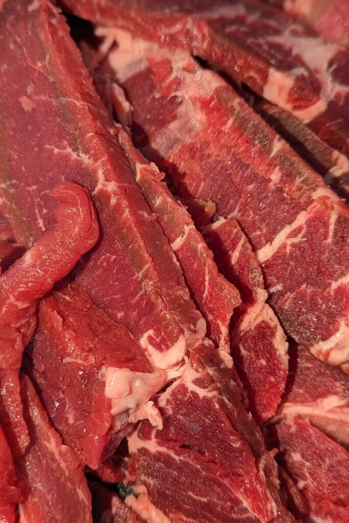 cut sirloin steak into thin strips