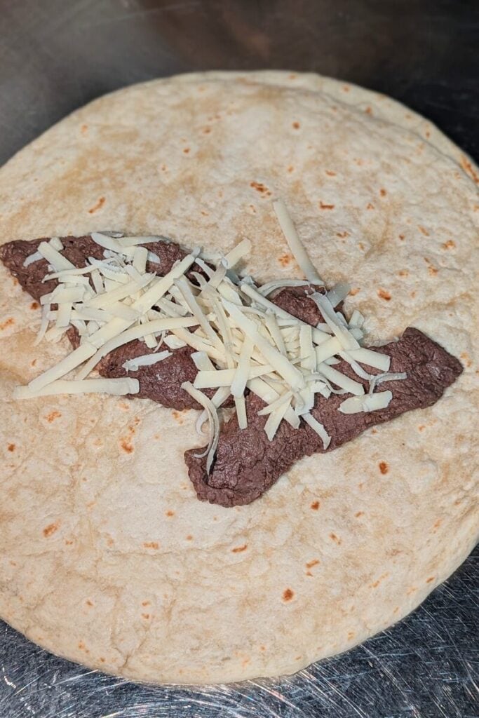 sprinkle with freshly grated gruyere cheese