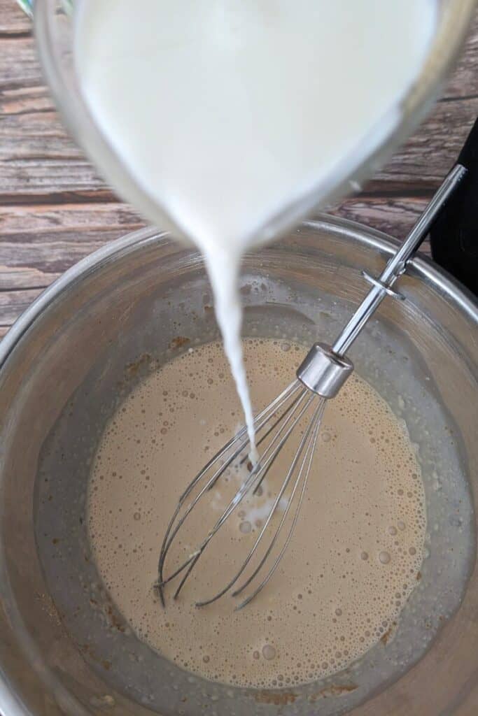adding milk to ice cream base