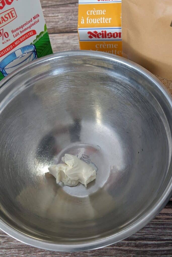 softened cream cheese in bowl for ice cream base