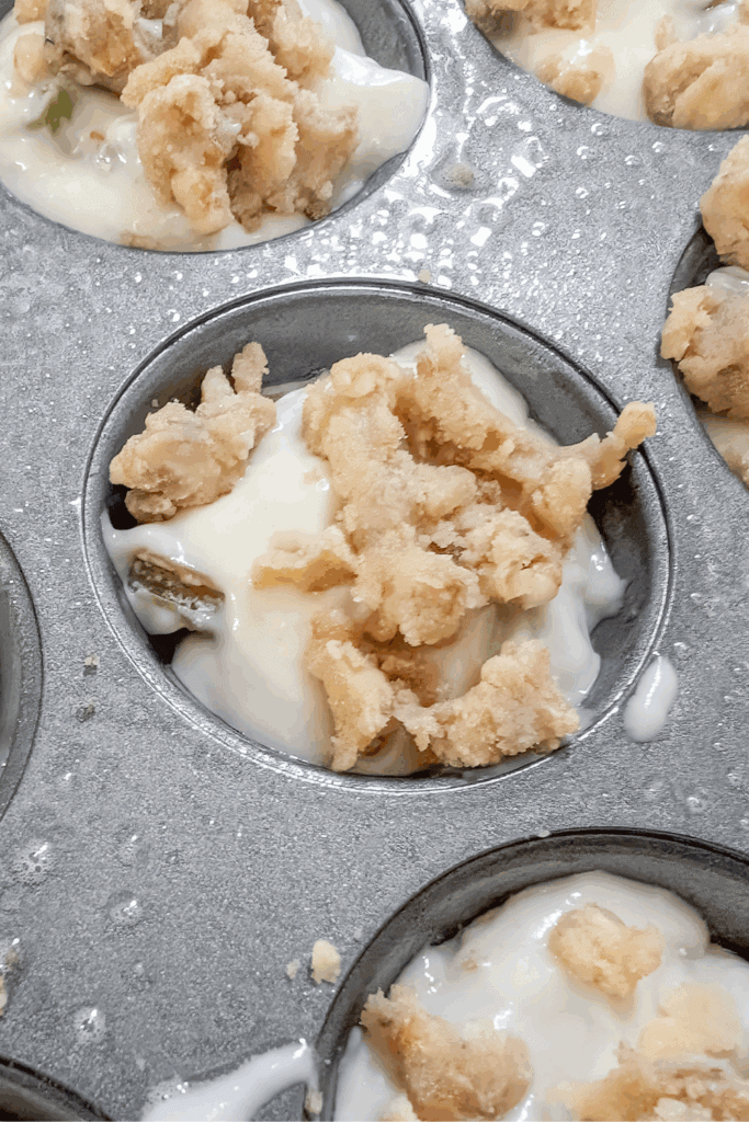 the walnut streusel on the muffin batter
