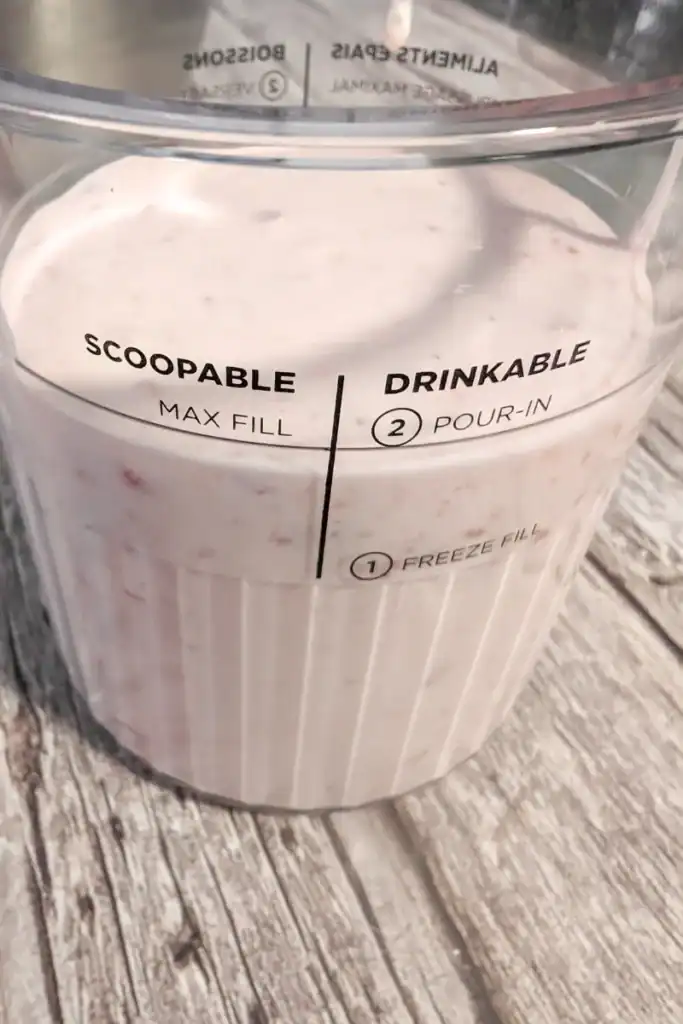 filling-ice-cream-pint-to-max-fill-line-for-freezing