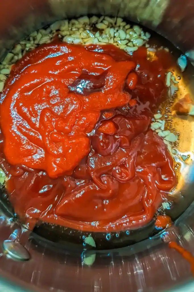 adding ketchup and sriracha to bbq sauce