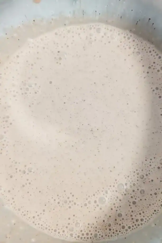adding the milk to the heavy cream ice cream base