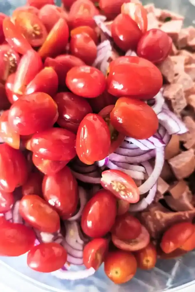 cherry tomatoes added whole to the pasta salad