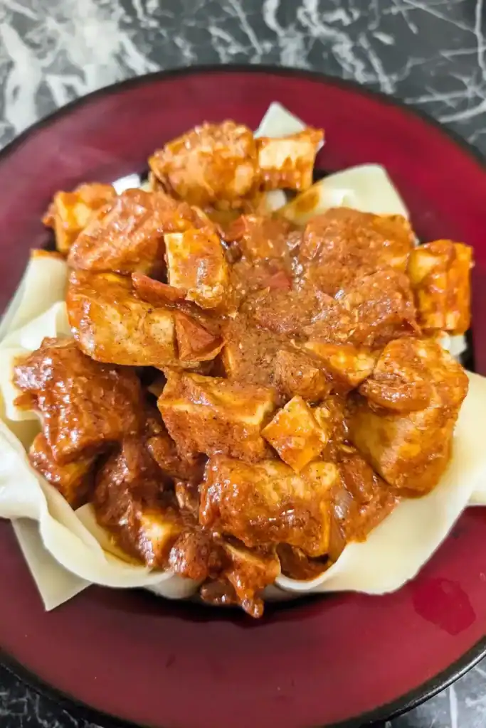 butter chicken pasta serving seen from above