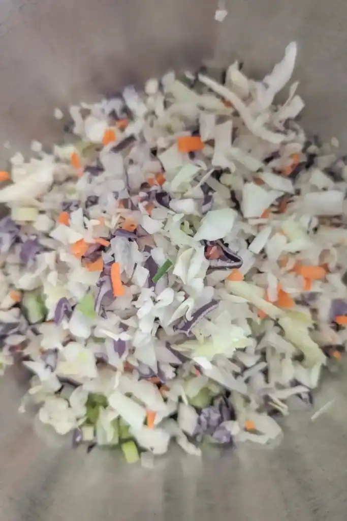 coleslaw store bought mix cut up finer in bowl with shrimp